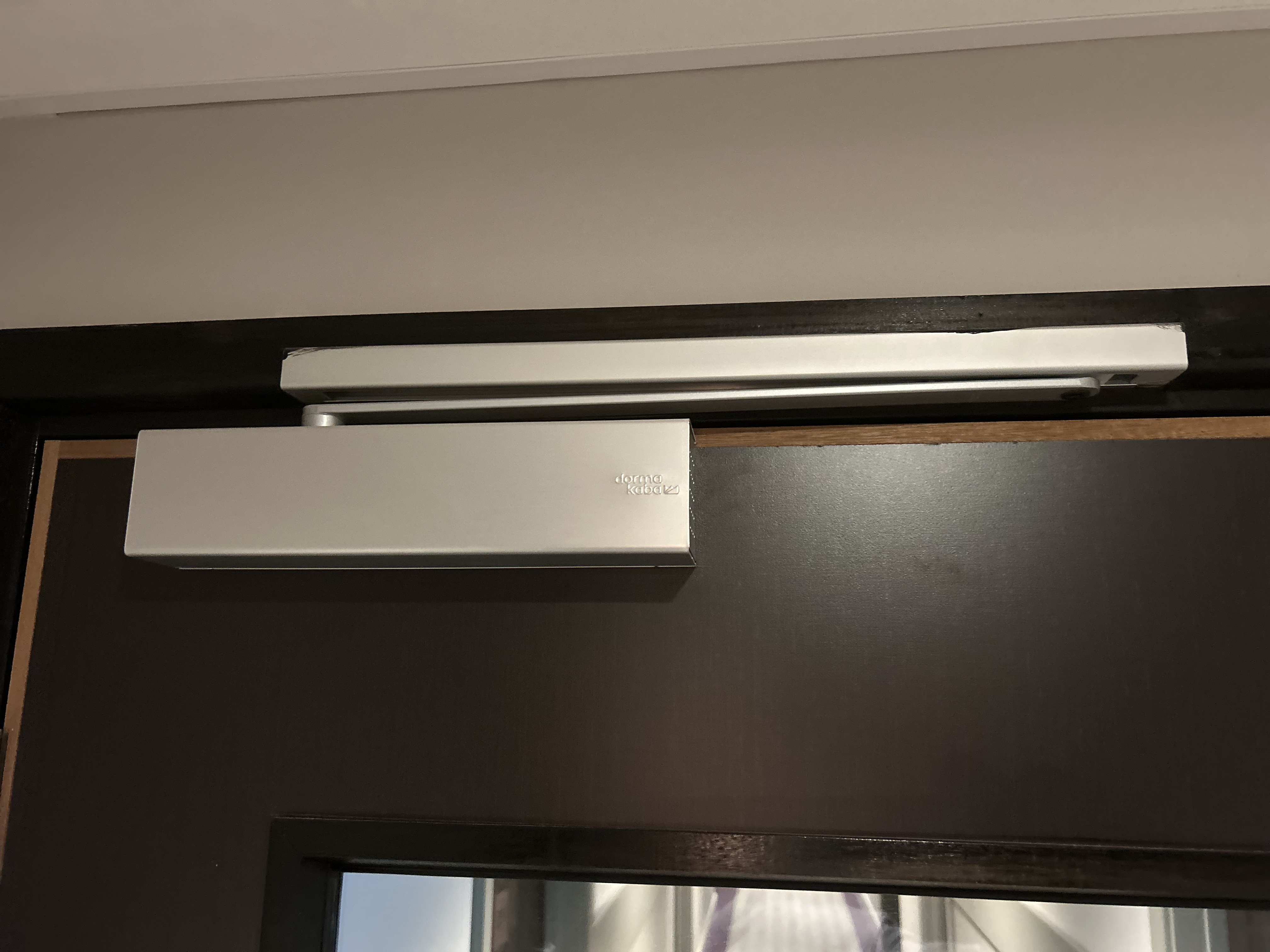 Cam action overhead fire door closer